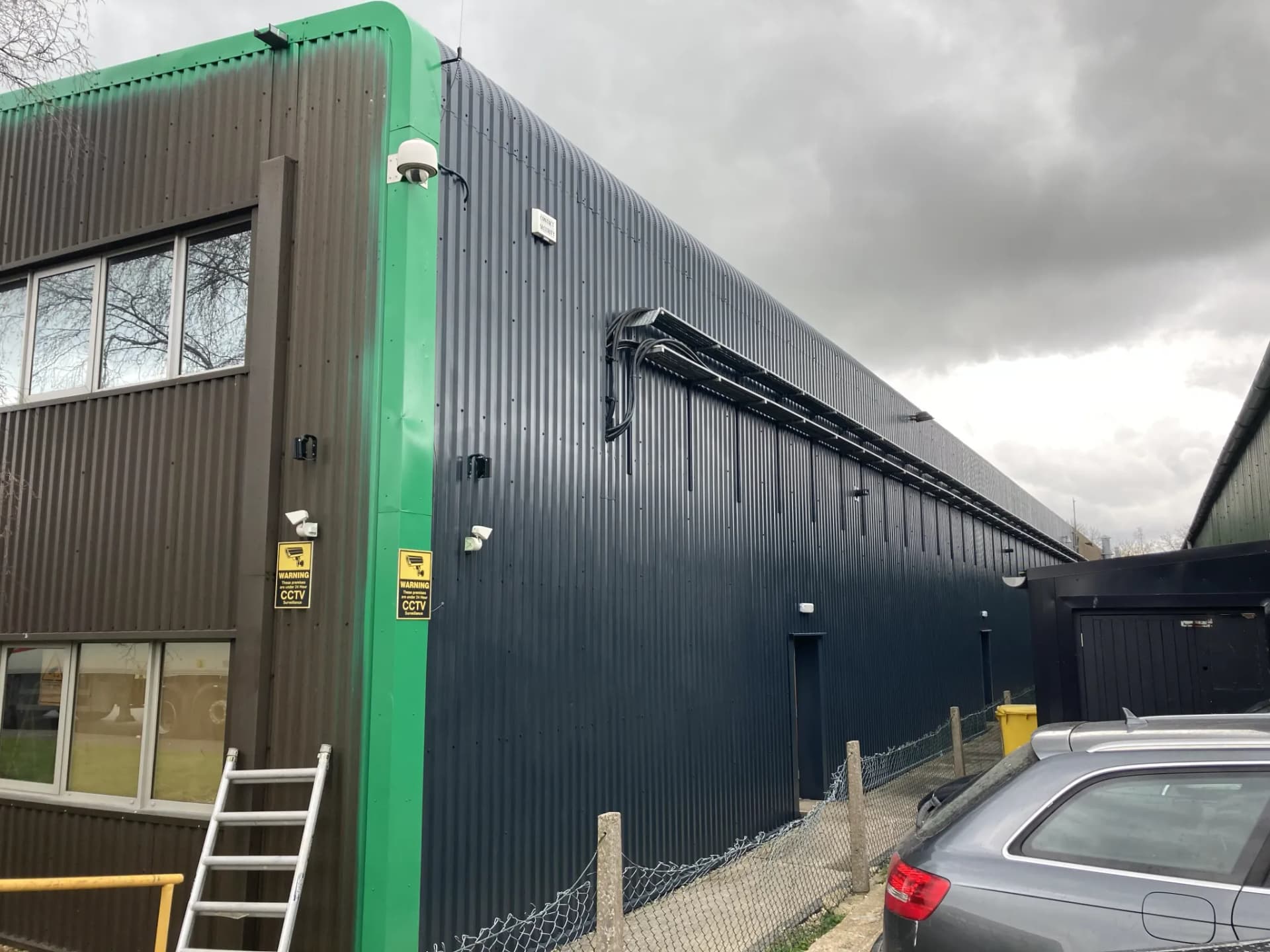 Cladding Spraying project in Hythe: Sprayed commercial cladding elevation